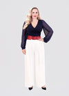 Navy Jersey Wrap Top with Chiffon Sleeves and White Trousers